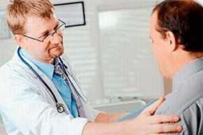 A man with a prostatitis in a doctor's appointment